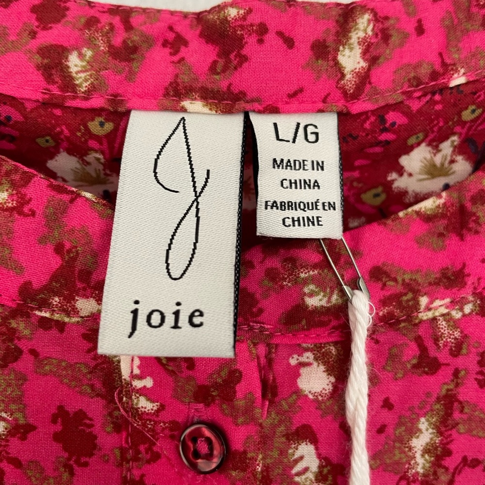 Pink ruffle top with tag